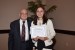 Dr. Nagib Callaos, General Chair, giving Mrs. Katsiaryna S. Baran the best paper award certificate of the session "Society, Information and Communication Technologies." The title of the awarded paper is "Acceptance and Quality Perceptions of Social Network Services in Cultural Context: Vkontakte as a Case Study."
